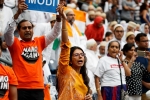 narendra modi speech at howdy modi, howdy modi photos, in pictures narendra modi indian americans at howdy modi, Indian flag