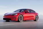 Tesla new electric car videos, Tesla new electric car, tesla to launch electric hatchback without a steering wheel, Tesla car without steering