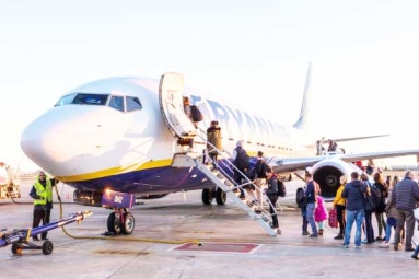 Why do passengers only board airplanes from the left side?