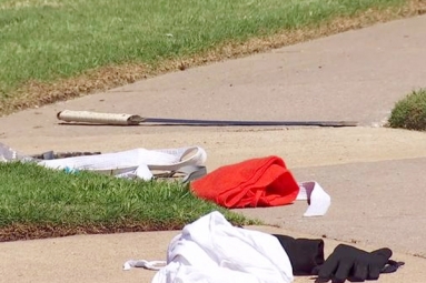 Police arrested man with sword wearing Samurai Armor, cape.