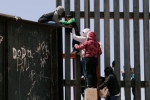 punjabis crossing mexico border, punjabi women, video clip shows punjabi women children crossing border fence into u s, Mexico border